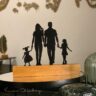 Troféu Silhueta Família Casal, Filha e Filha Bebê